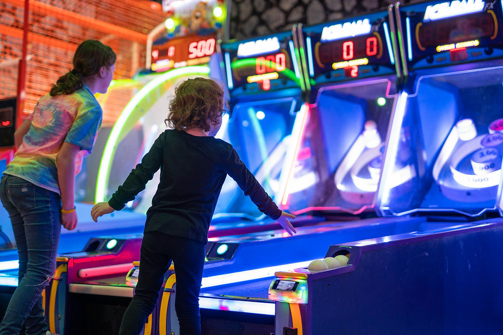 The Edge I Kid Playing at Arcade
